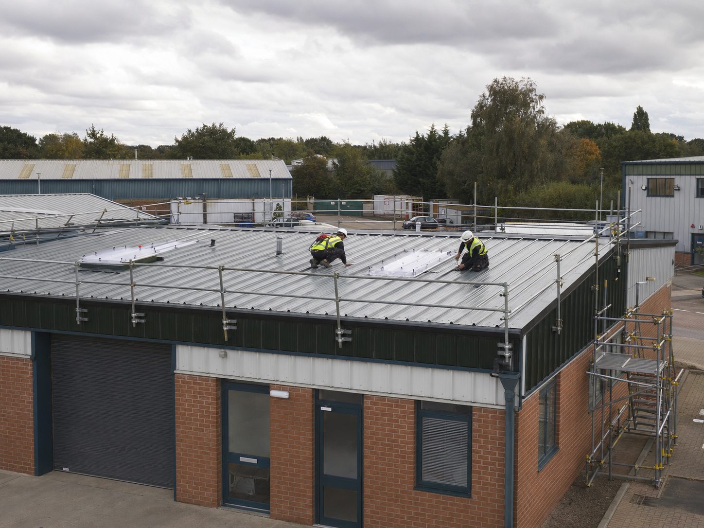 site photograph of commercial roof works on a unit at Acle livestock market, Acle off the A47 Acle Straight — general roofing across Broadland District Council